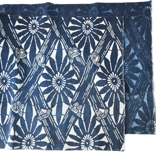 Antique indigo katazome dyed cotton with chrysanthemum and bamboo motifs from early 20th century.