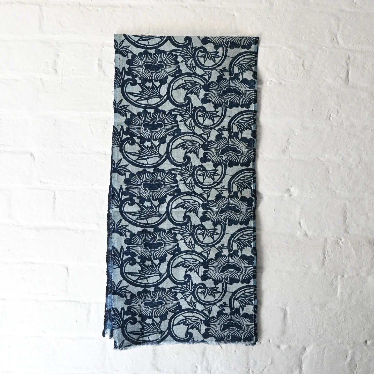 Antique indigo katazome cotton with peony arabesque motif in layered indigo tones.