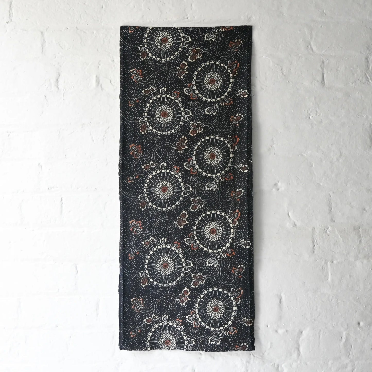 Antique indigo katazome dyed cotton, chrysanthemum arabesque motif in indigo with Bengala red accents.