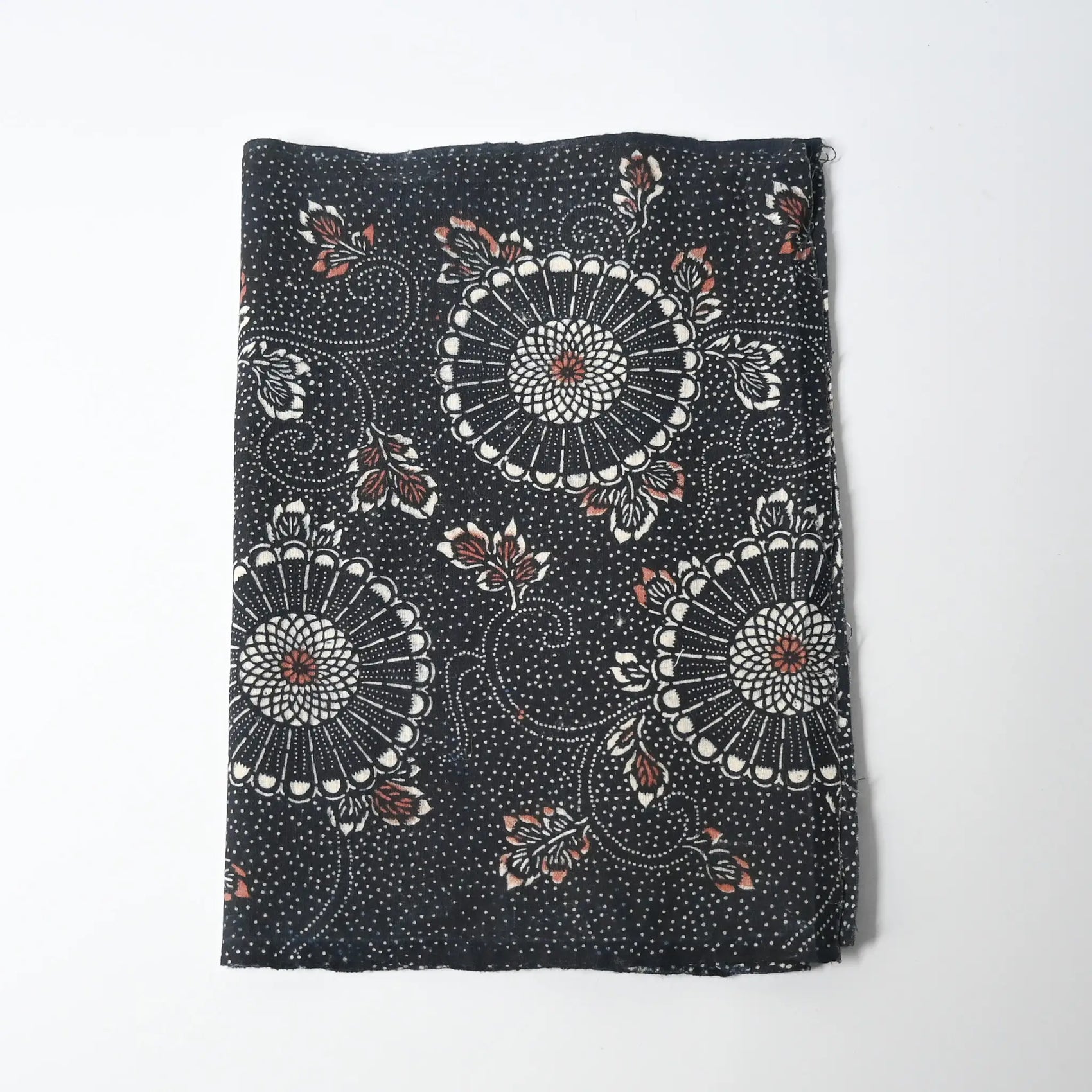 Antique indigo katazome dyed cotton, chrysanthemum arabesque motif in indigo with Bengala red accents.