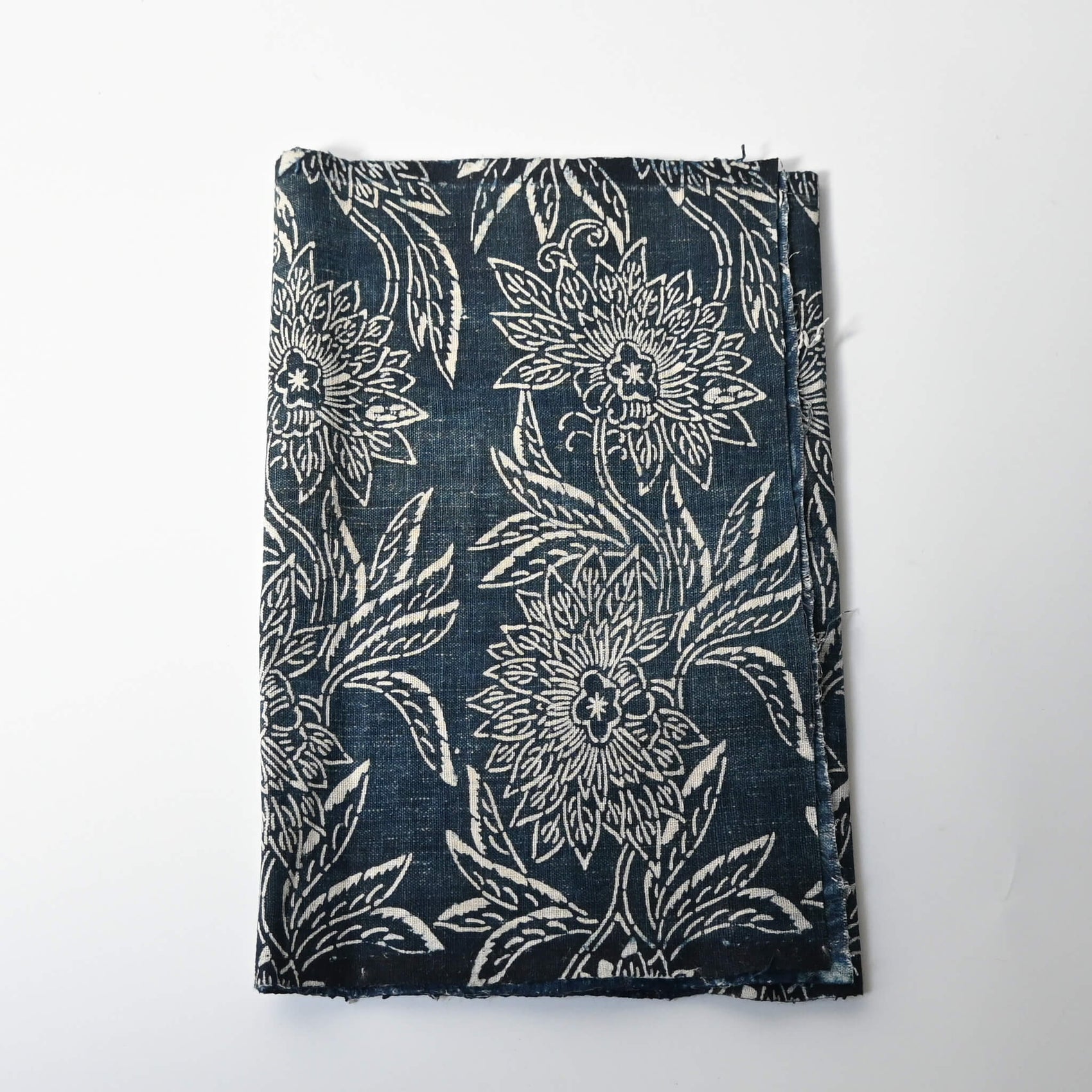 Antique indigo katazome dyed cotton futon cover panel with chrysanthemum pattern.