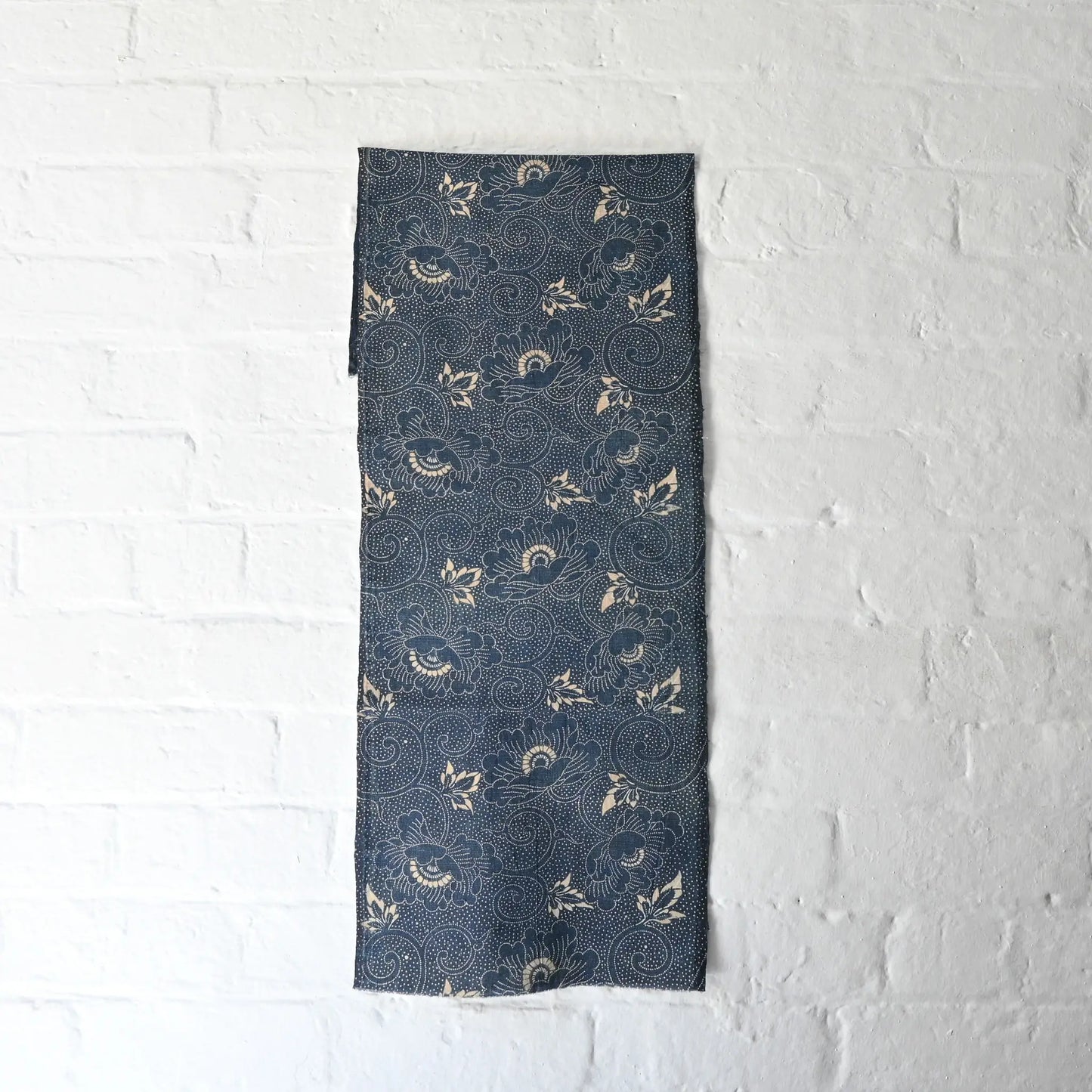 Full view of antique indigo katazome futon cover panel with peony arabesque from early 20th century.