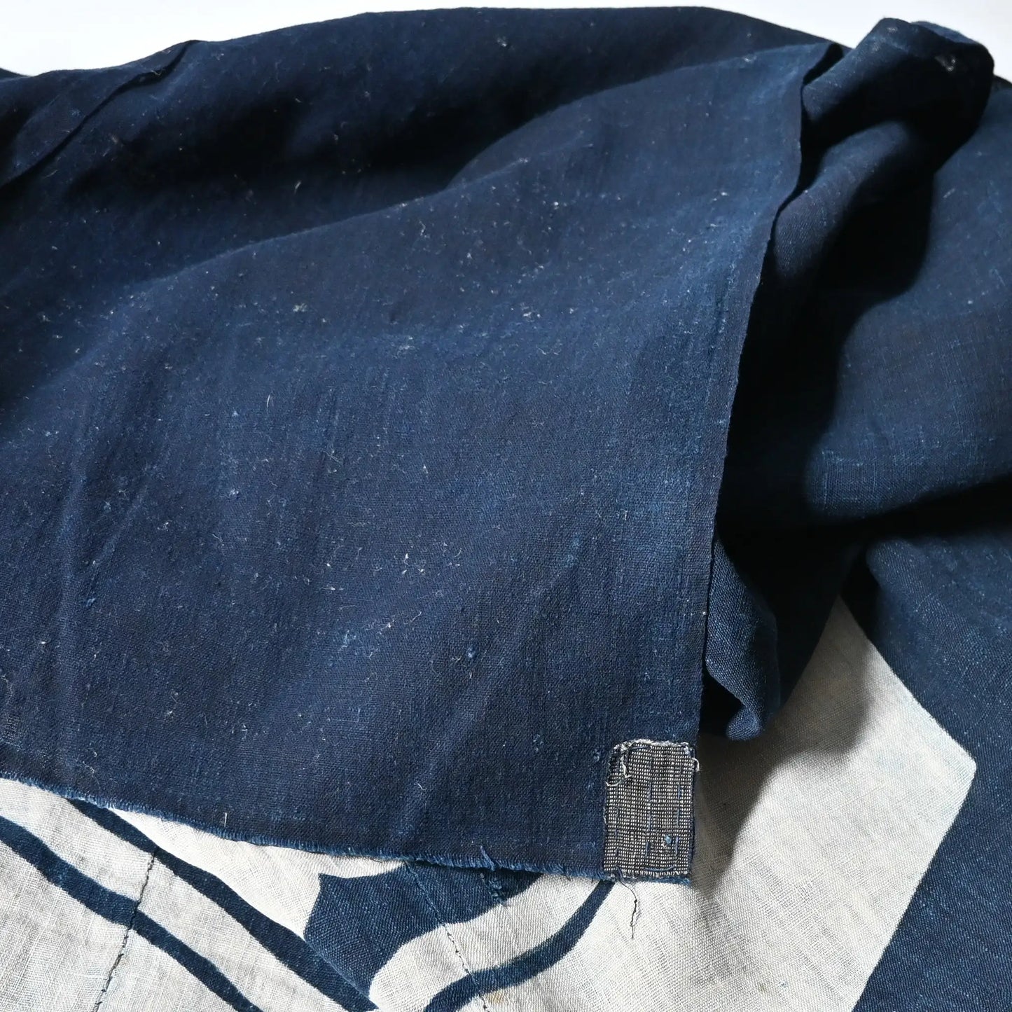 Reverse side of antique Japanese large indigo tsutsugaki dyed cotton futon cover from 19th Century.