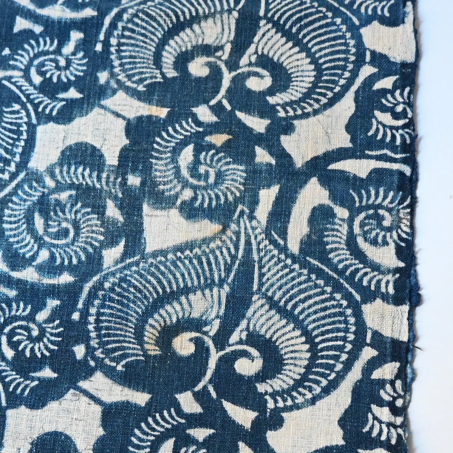Rare antique Japanese indigo Jishiro Katazome cotton futon cover panel with a striking hollyhock arabesque pattern shows a sign of use.
