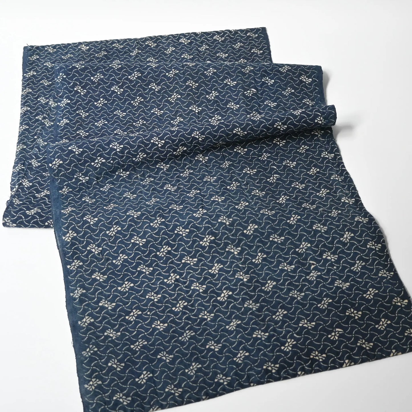 Full view of antique Japanese indigo katazome dyed cotton with intricate small pattern from the early 20th century.