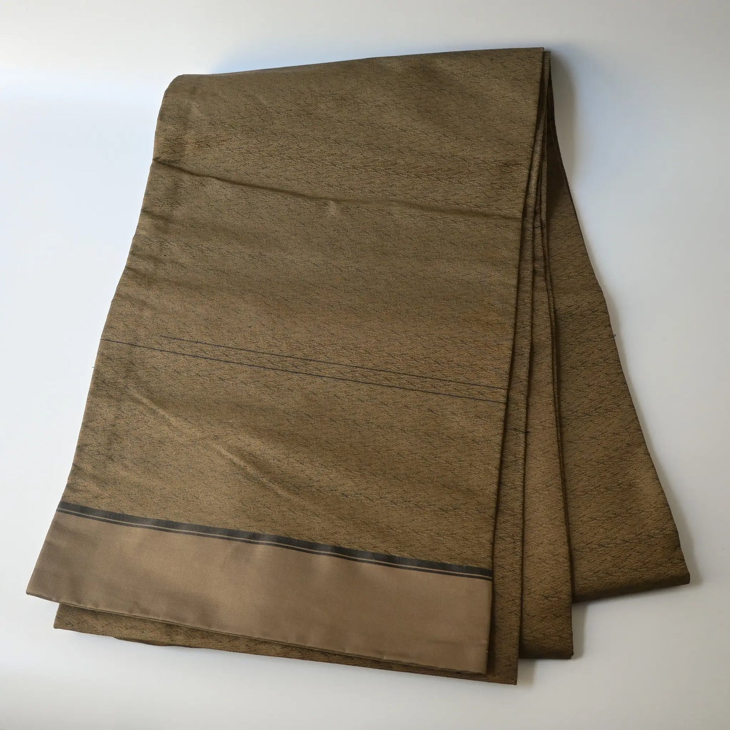 Full view of antique Japanese silk brocade Maru Obi with pine needle motif in dark khaki green.