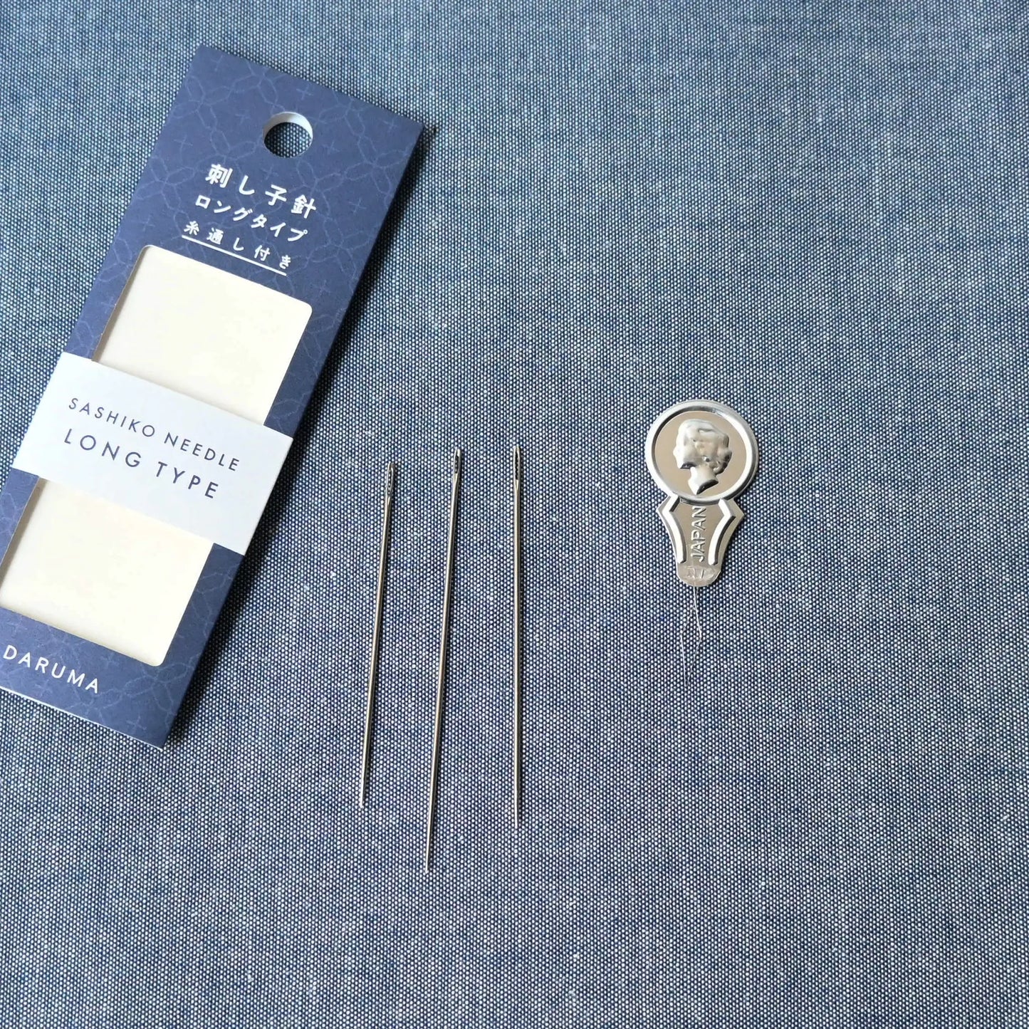 Set of three Japan-made sashiko needles from Daruma, with different lengths and thicknesses, comes with a needle threader.