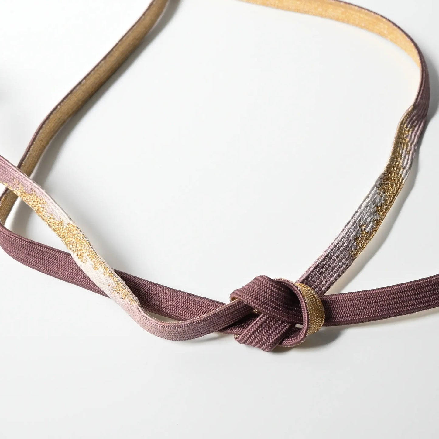 Vintage/recycled women's kimono dress accessories, Obijime cord in dusty mauve and gold.