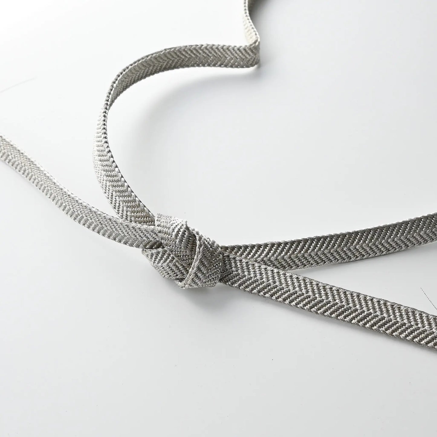 Vintage/recycled women's kimono dress accessories, Obijime cord in metallic silver.