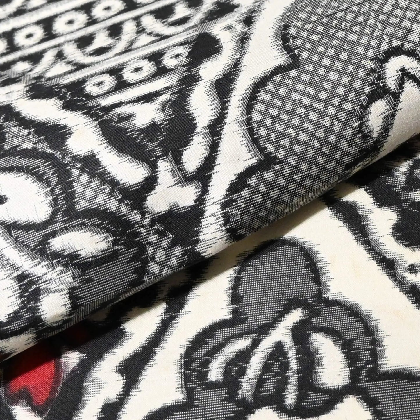 Detailed view of vintage meisen silk weave and texture.