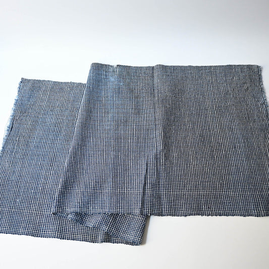 Full view of vintage Chinese hand loomed indigo check cotton piece.