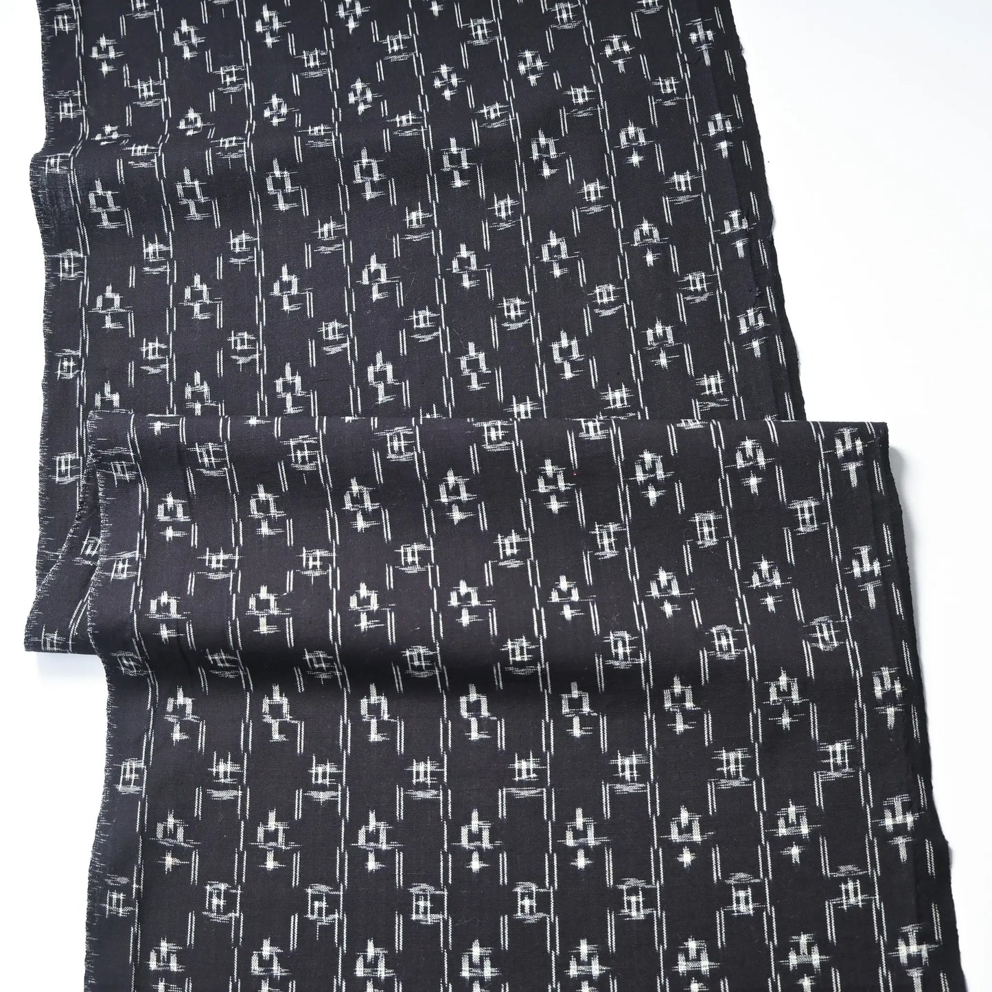 Full view of vintage Japanese dark navy kasuri kimono fabric cotton.