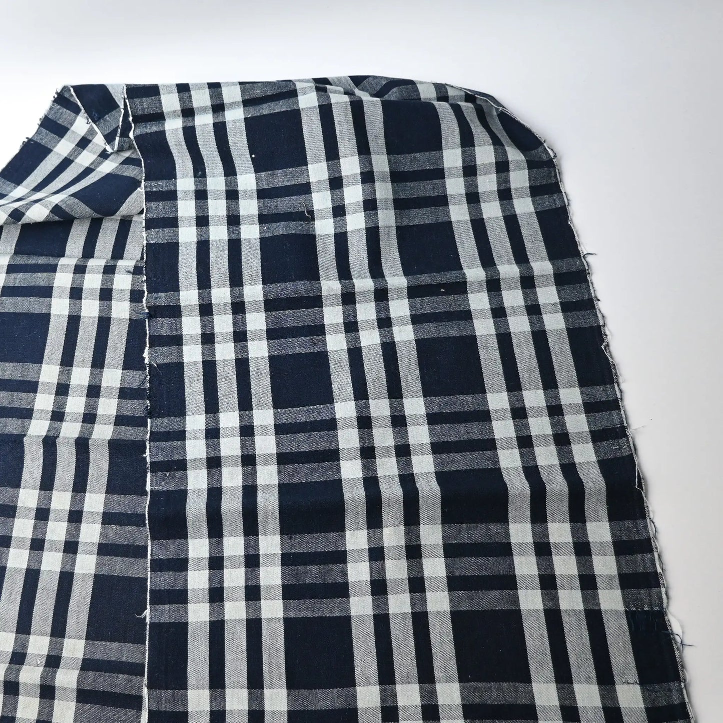 Full view of vintage Japanese indigo check cotton, a futon cover panel from the 20th century.