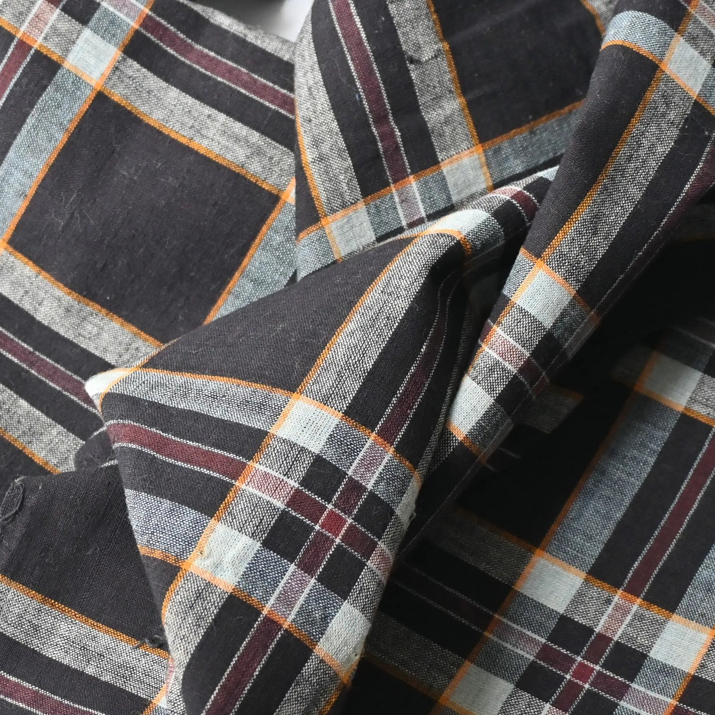 Close-up view of vintage indigo check cotton piece from a futon cover, mid-20th century.