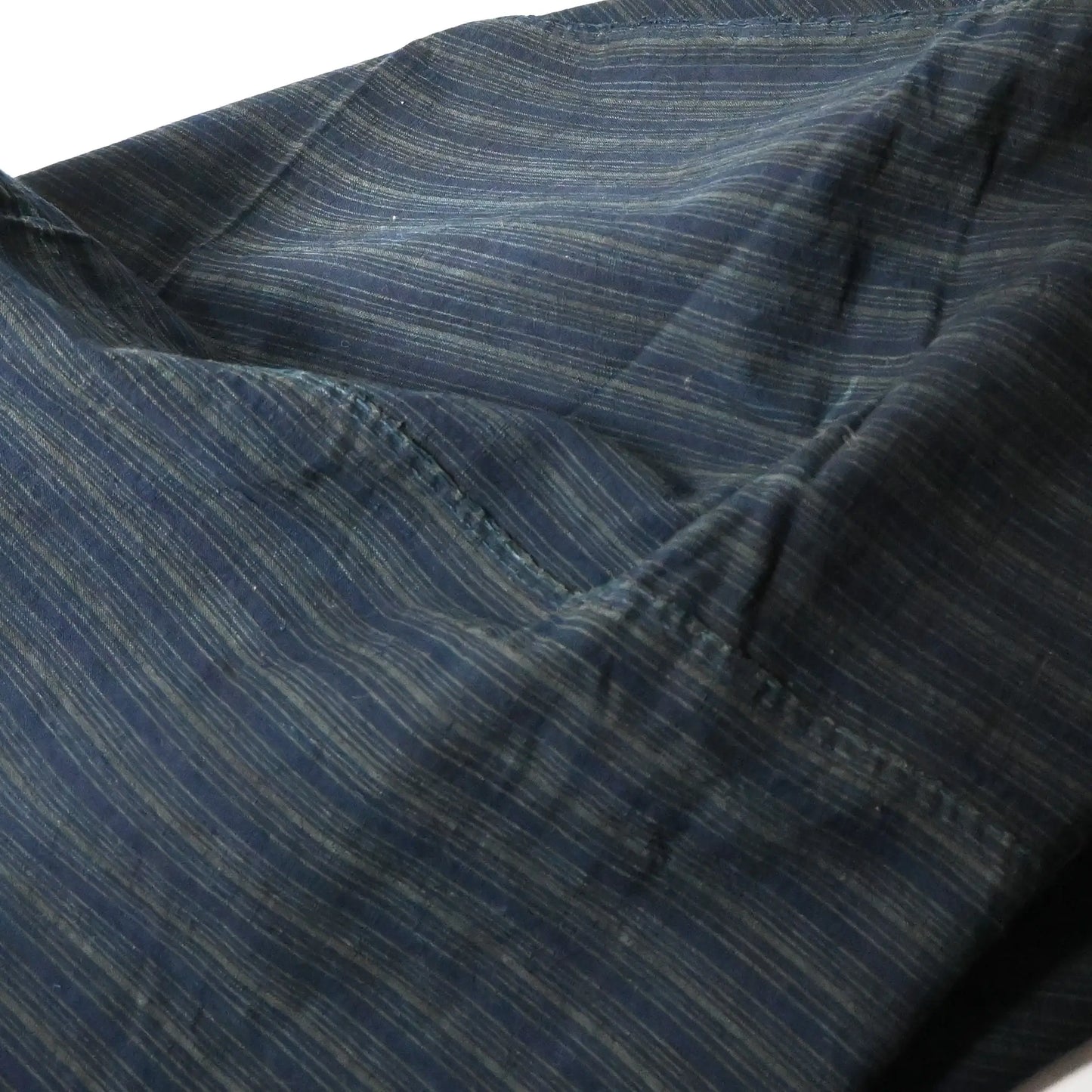 Detailed view of vintage Japanese indigo stripe cotton large furoshiki from the mid-20th century.