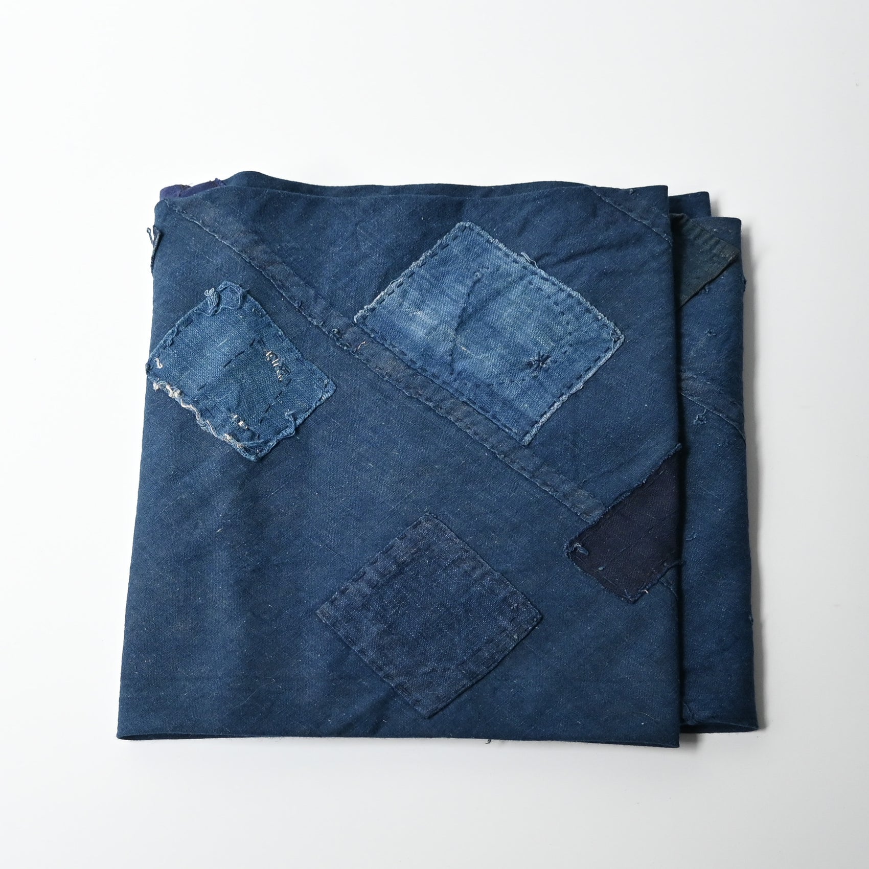 Rare vintage indigo cotton tube cloth with mends.
