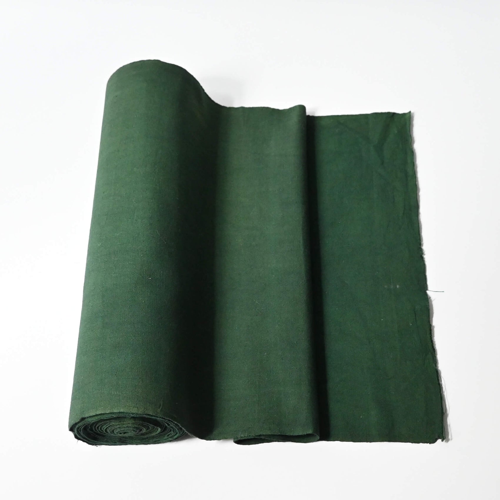 Vintage Japanese dead stock indigo green futon cover fabric bolt from early to mid 20th C, sold by the metre.