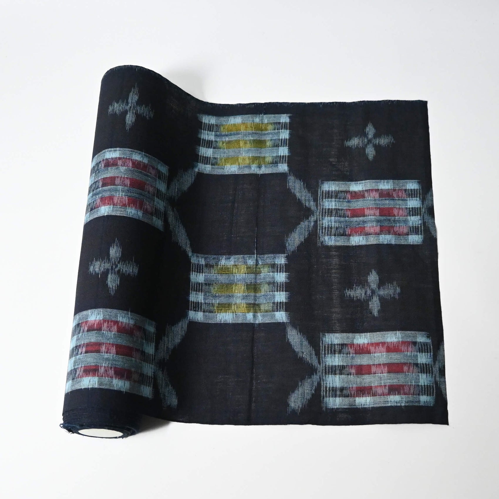 Vintage Japanese Bingo kasuri cotton kimono fabric roll sold by the metre.