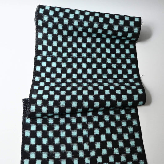 Full view of vintage Japanese indigo classic kasuri check cotton sold by the metre.