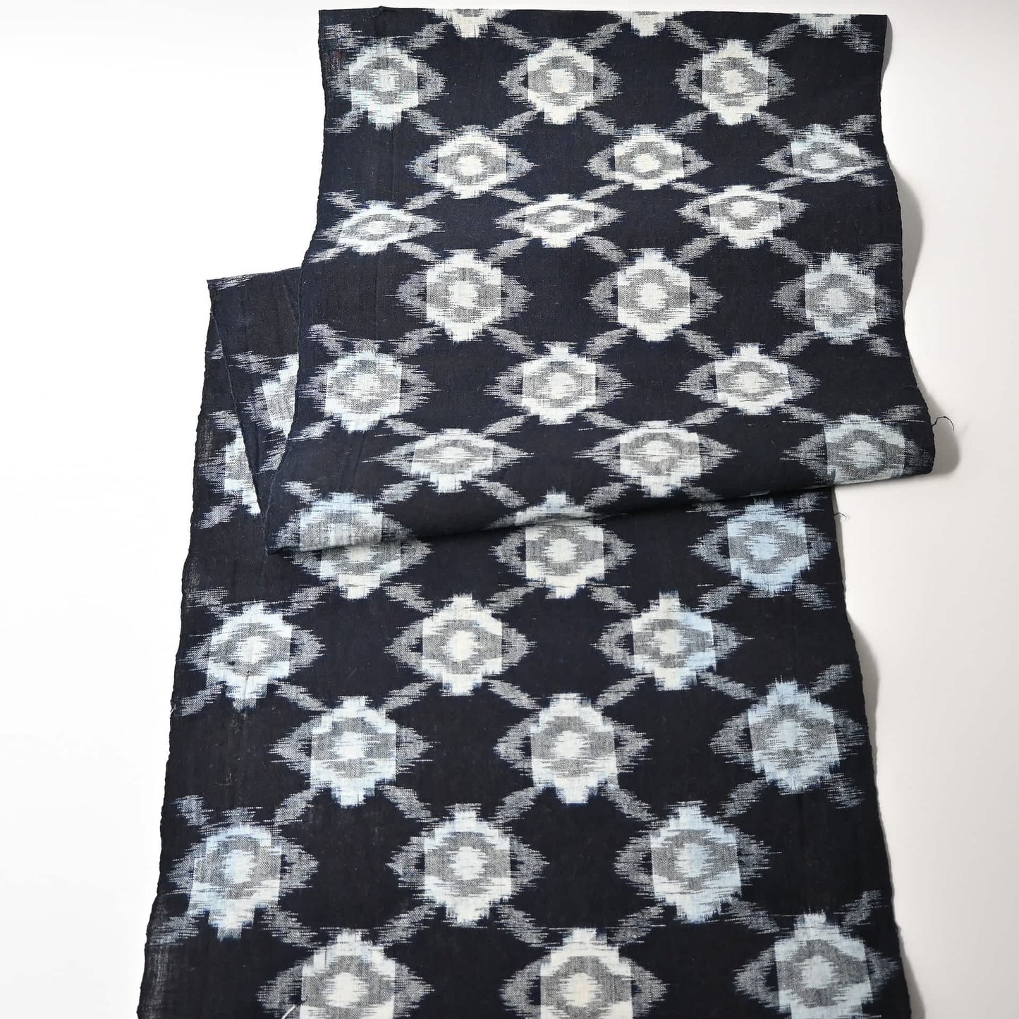 Full view of vintage Japanese indigo Kasuri cotton kimono piece from the mid-20th century.