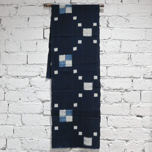 Full view of vintage Japanese indigo kasuri cotton panel from San'in region, a simple geometric pattern.