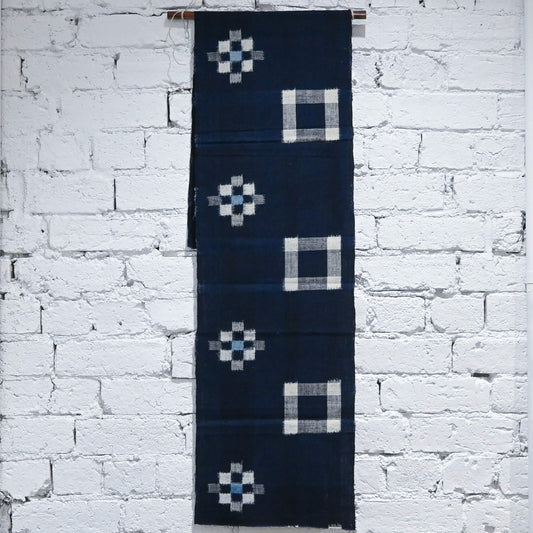 Full view of vintage Japanese indigo kasuri cotton panel from San'in region, a simple geometric pattern.