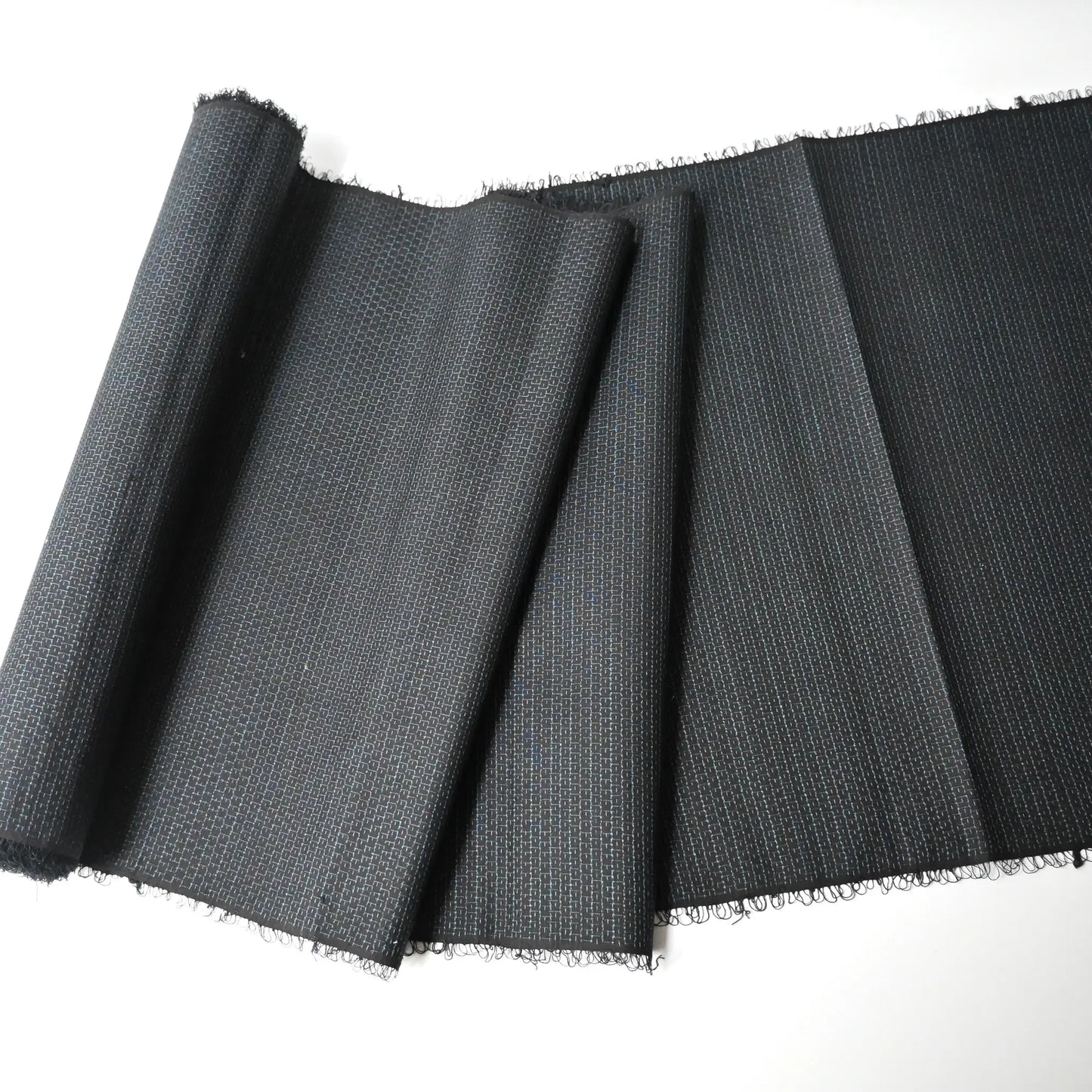 Full view of vintage men's kimono silk fabric roll in black with blue woven Kikko hexagon motif.