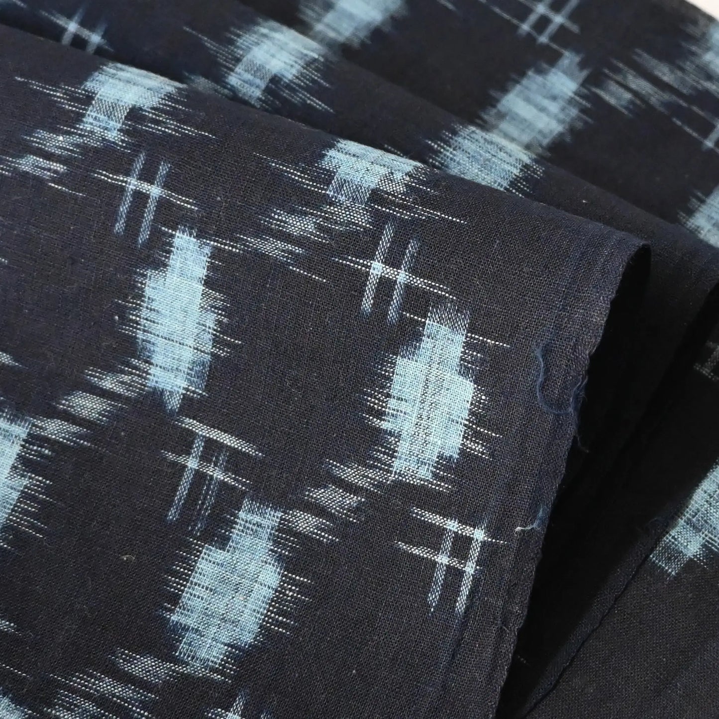 Detailed view of vintage Japanese indigo Bingo kasuri cotton piece, originally a kimono.