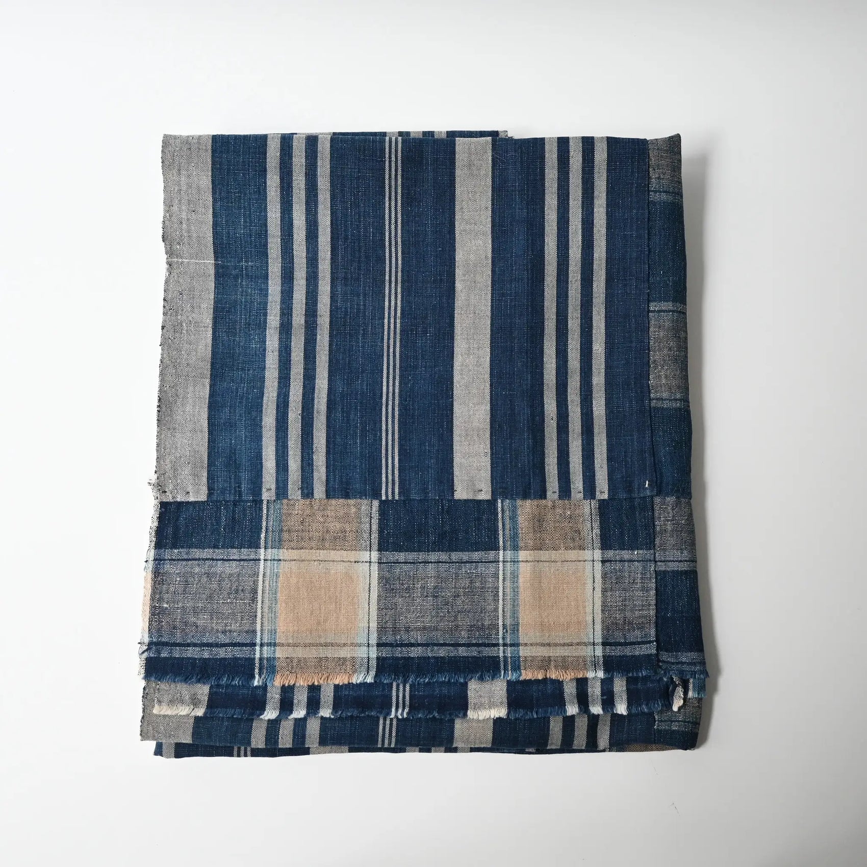 Vintage Japanese indigo futon cover with check and stripe from mid-20th century.