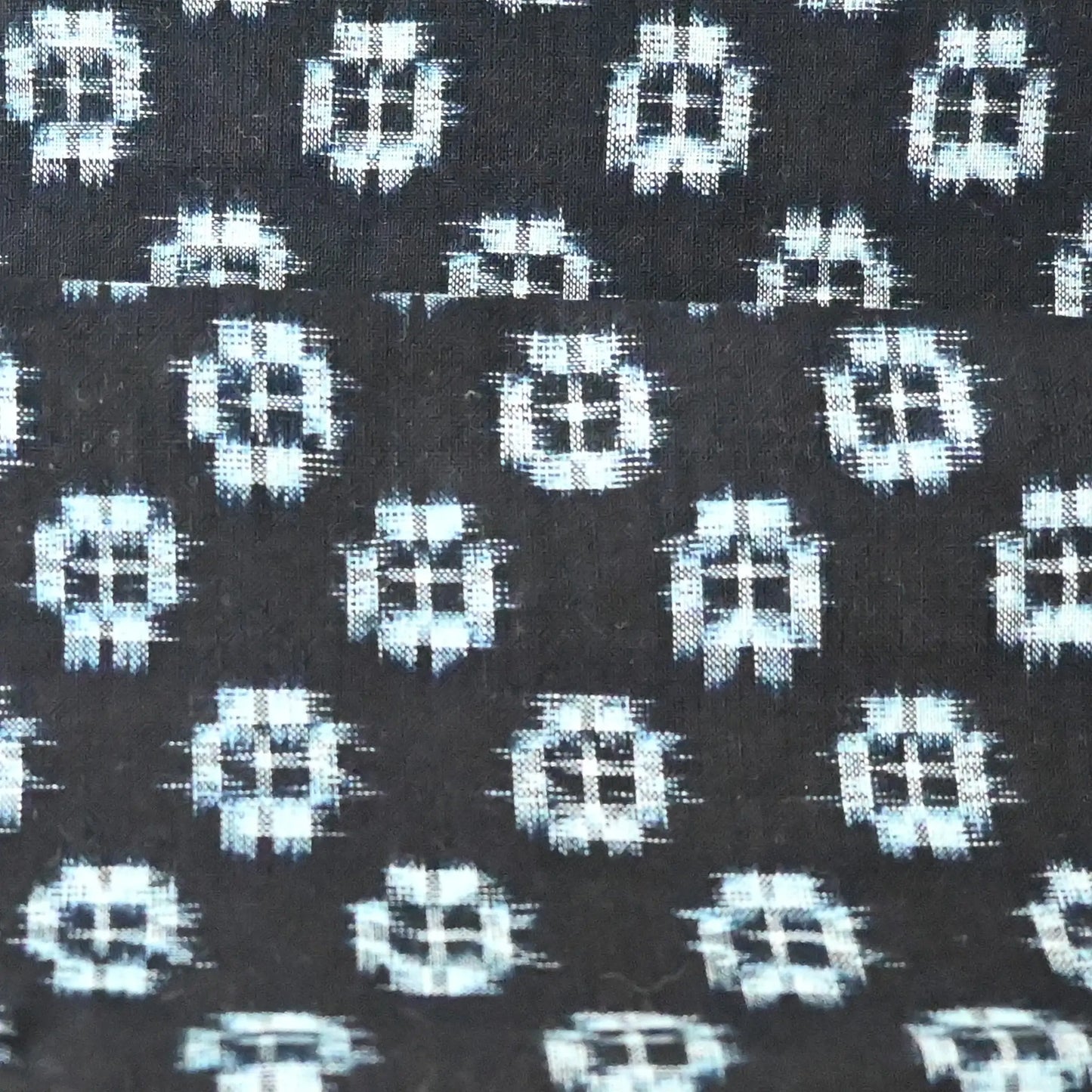 Detailed view of vintage Japanese indigo cotton piece with Igeta Kasuri pattern.
