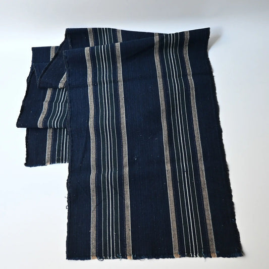 Full view of vintage Japanese indigo futon cover panel, stripe with green and beige.