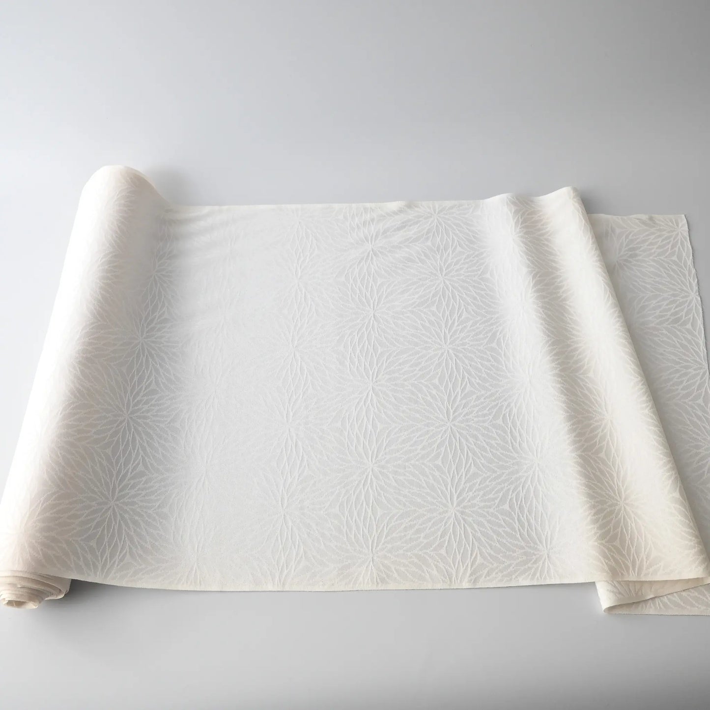 Full view of vintage Japanese kimono bolt, plain silk jacquard with chrysanthemum pattern.