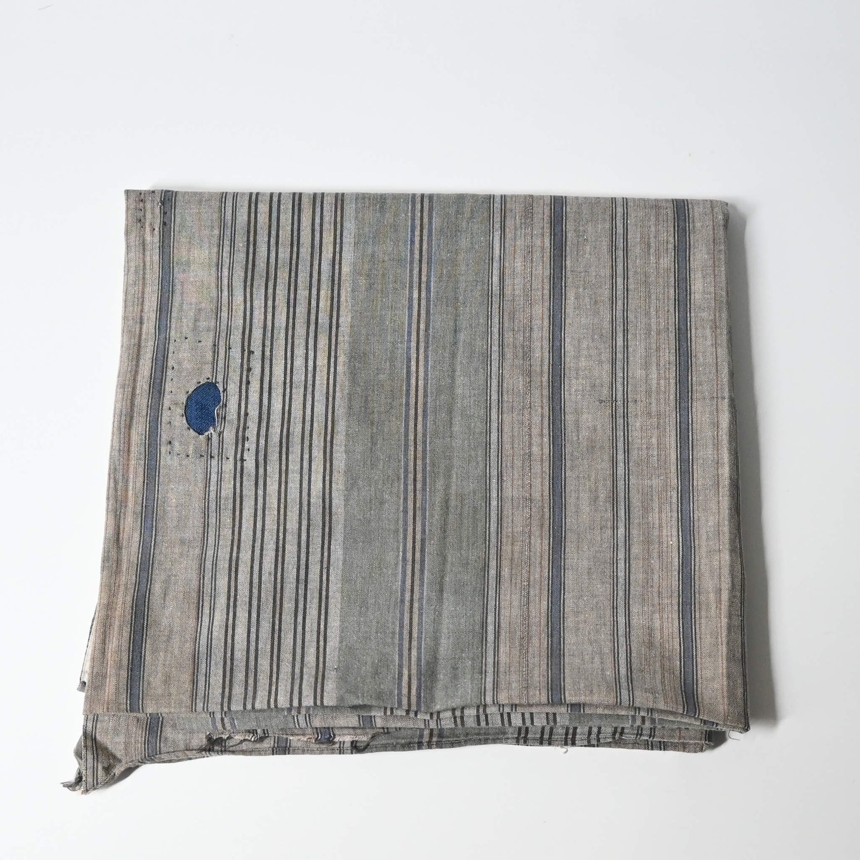 Vintage stripe cotton furoshiki in soft grey tone, with some mended patches with indigo cottons.