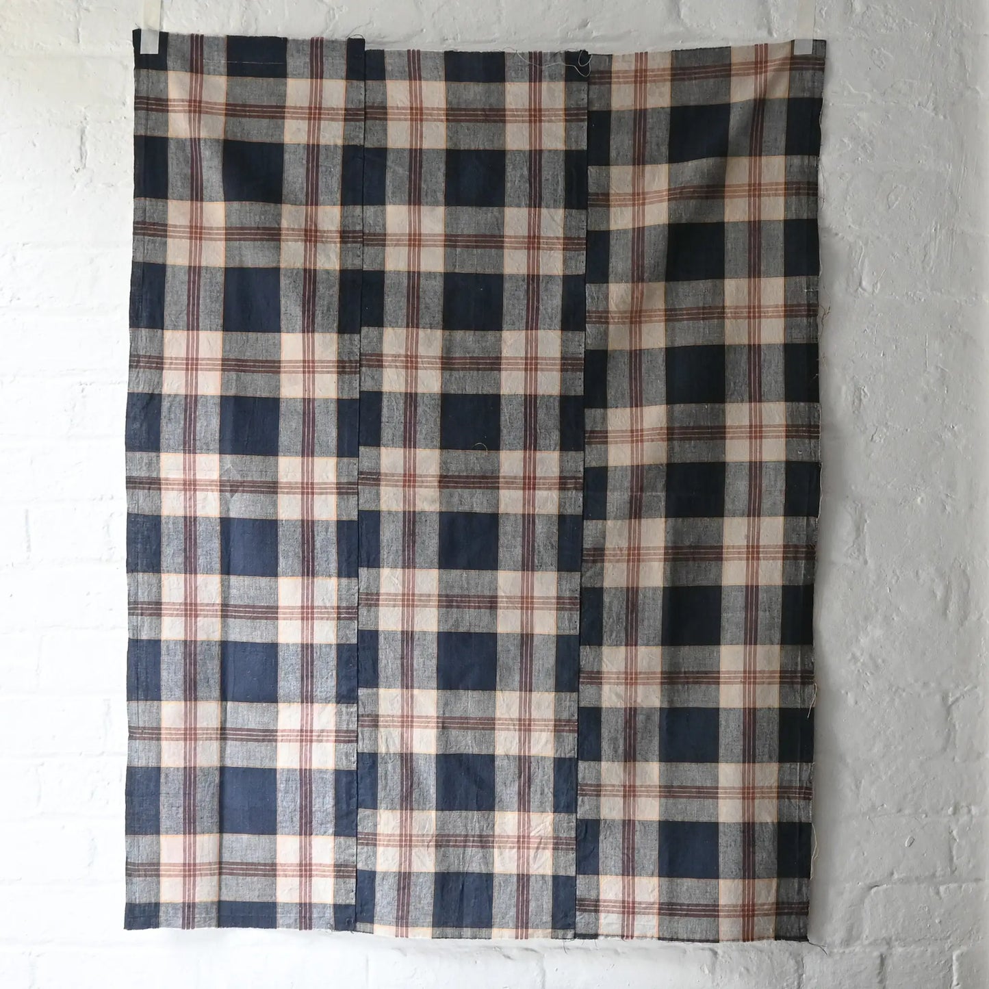 Full view of vintage three-panel indigo plaid check cotton piece from the mid-20th century.