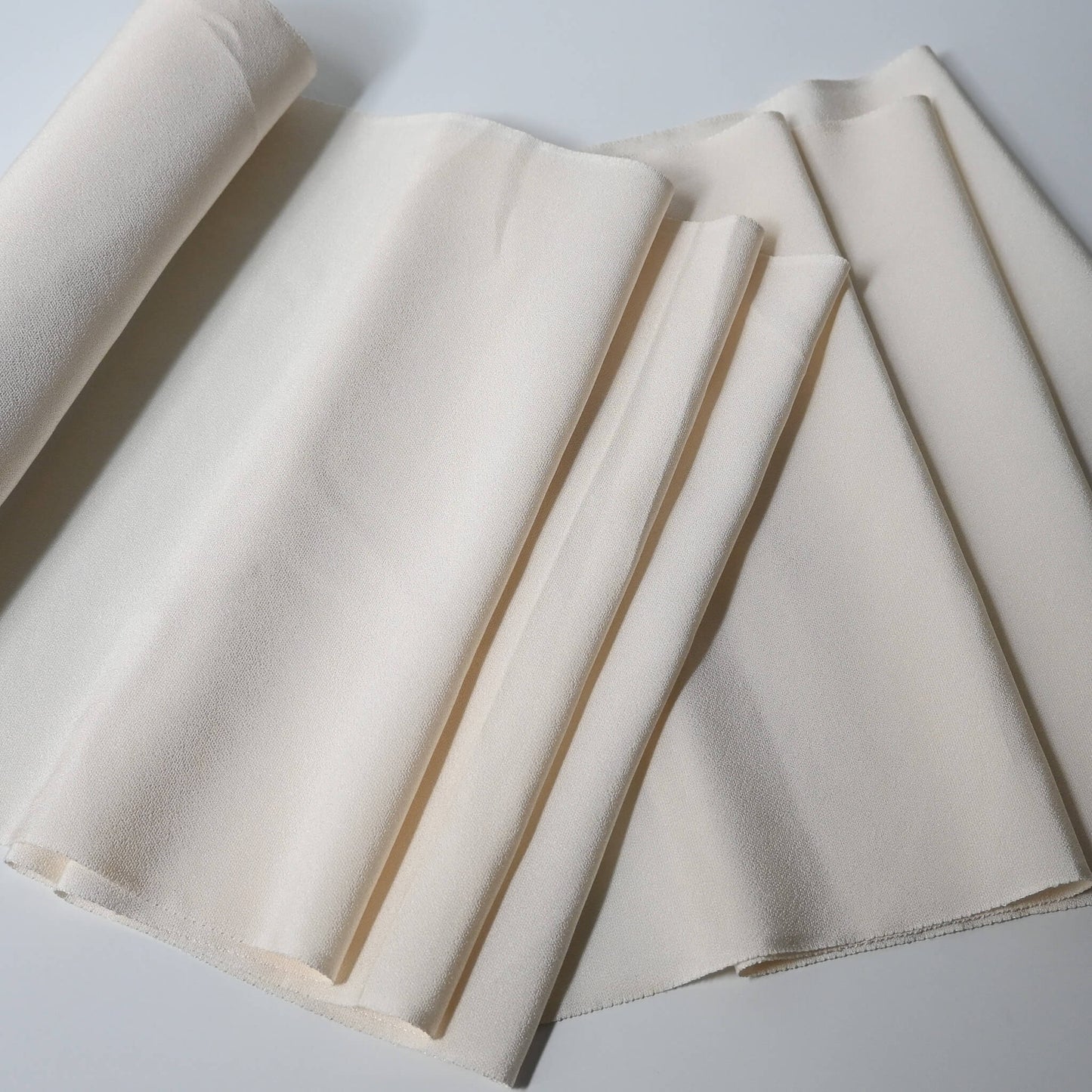 Vintage Japanese undyed plain silk kimono fabric in cream, ivory tone.