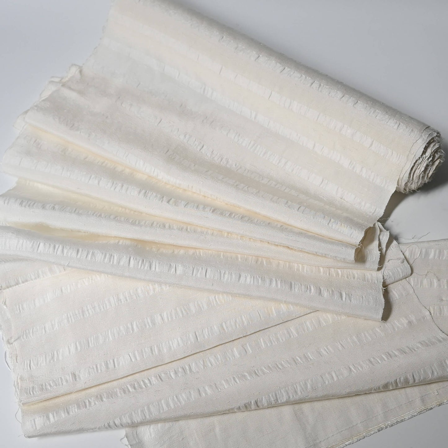 Vintage undyed textured stripe silk kimono fabric sold by the metre.