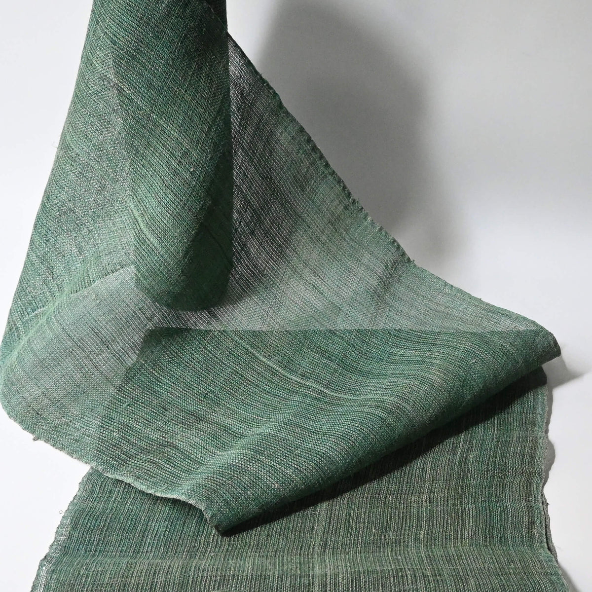 Antique indigo green hemp, indigo with yellow dye, open weave and coarse feel.