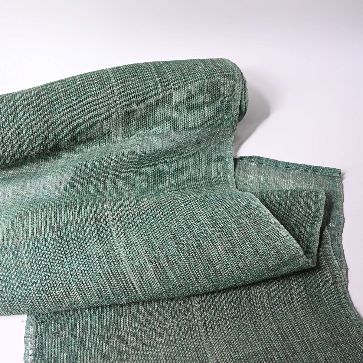 Antique indigo green hemp, indigo with yellow dye, open weave and coarse feel.