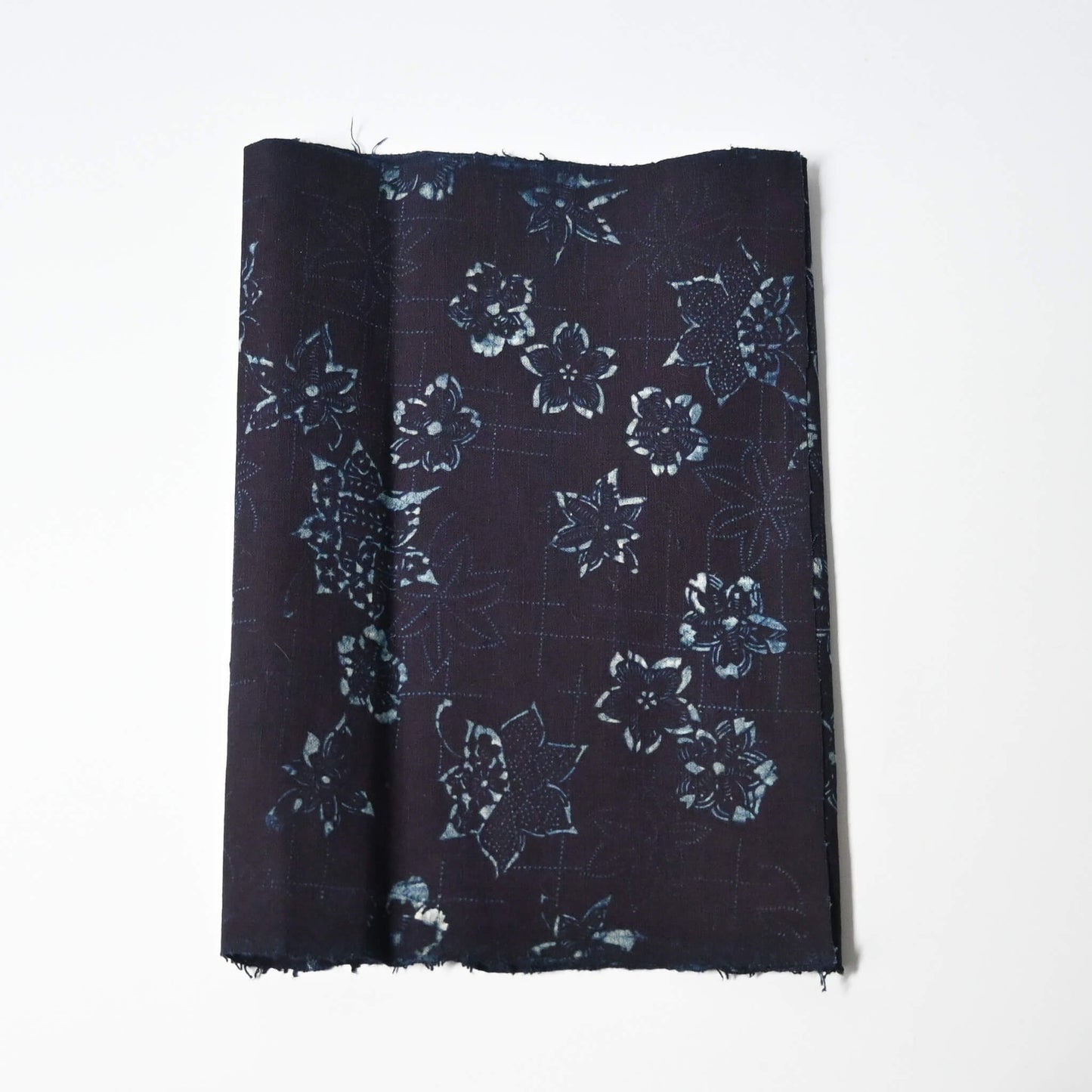 Antique indigo katazome stencil dyed cotton with cherry blossom and maple leaf motifs, early 20th century.