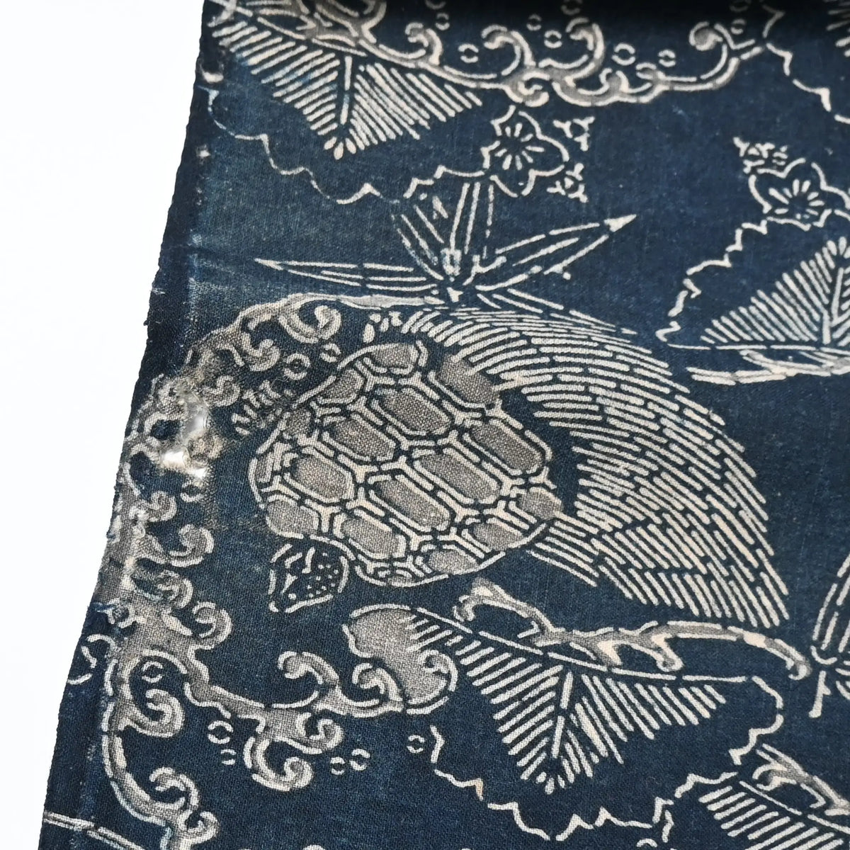Detailed view of antique indigo Katazome dyed cotton with crane and tortoise form the early 20th century.