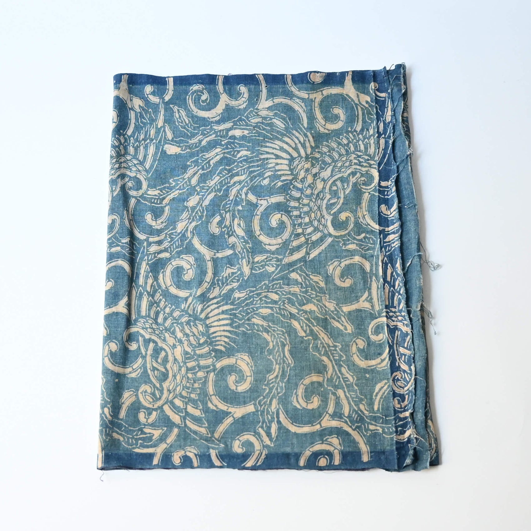Antique indigo katazome cotton with phoenix pattern from the early 20th century.