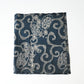 Antique indigo katazome cotton with wagasa and plum blossom motifs, from early 20th century.
