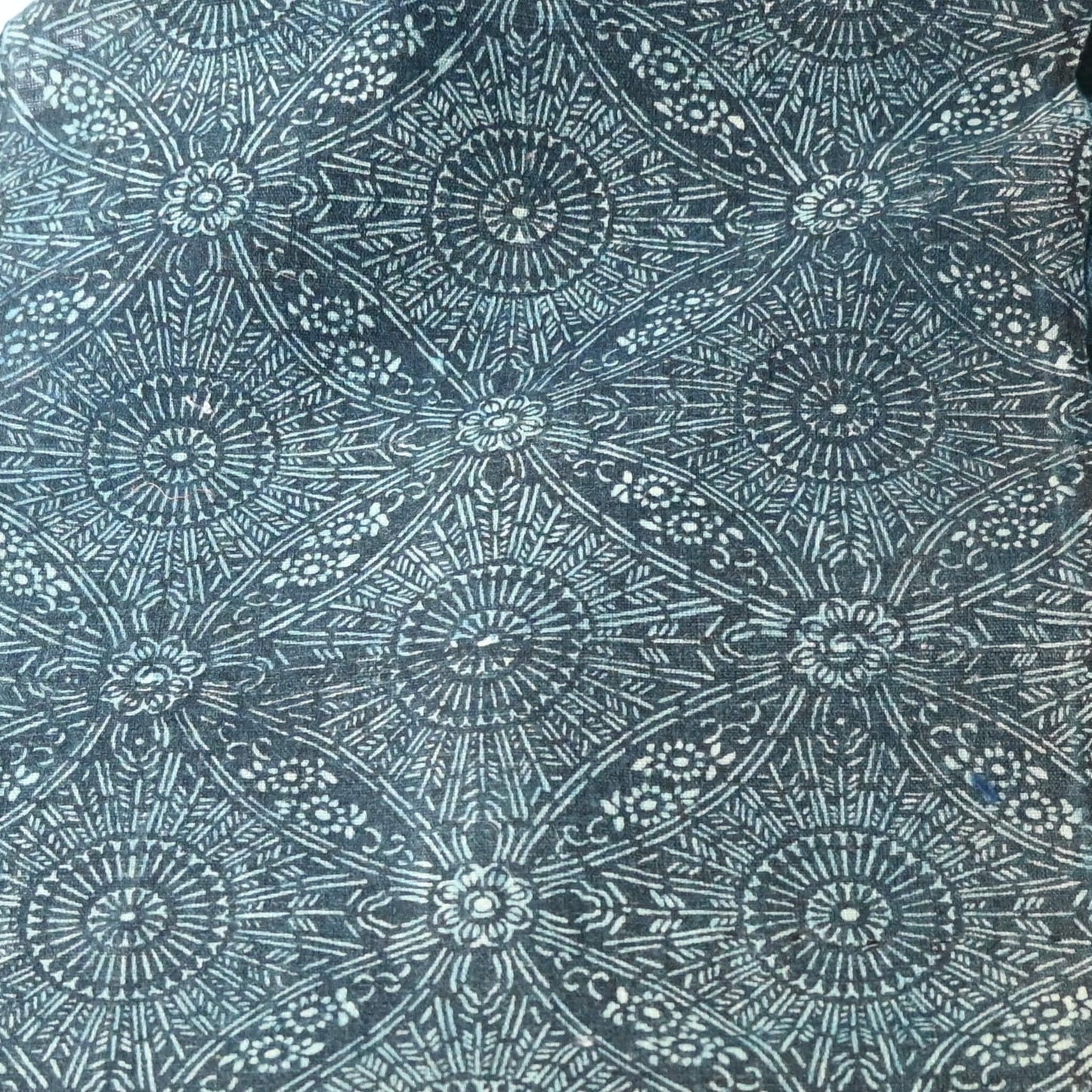 Detailed view of antique indigo katazome cotton futon cover panel from the early 20th century.