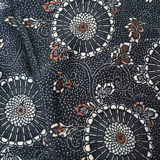 Antique indigo katazome dyed cotton, chrysanthemum arabesque motif in indigo with Bengala red accents.