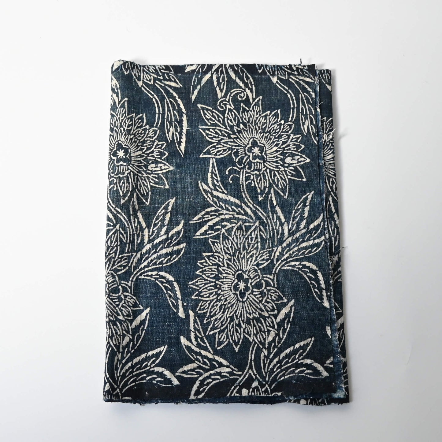 Antique indigo katazome dyed cotton futon cover panel with chrysanthemum pattern.