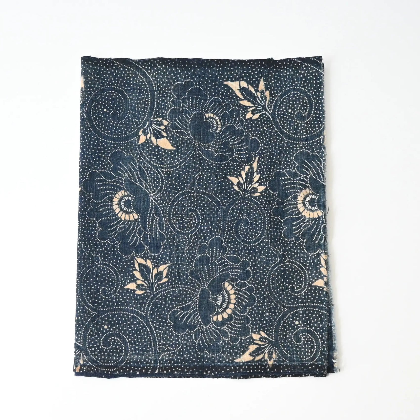 Antique indigo katazome futon cover panel with peony arabesque from early 20th century.