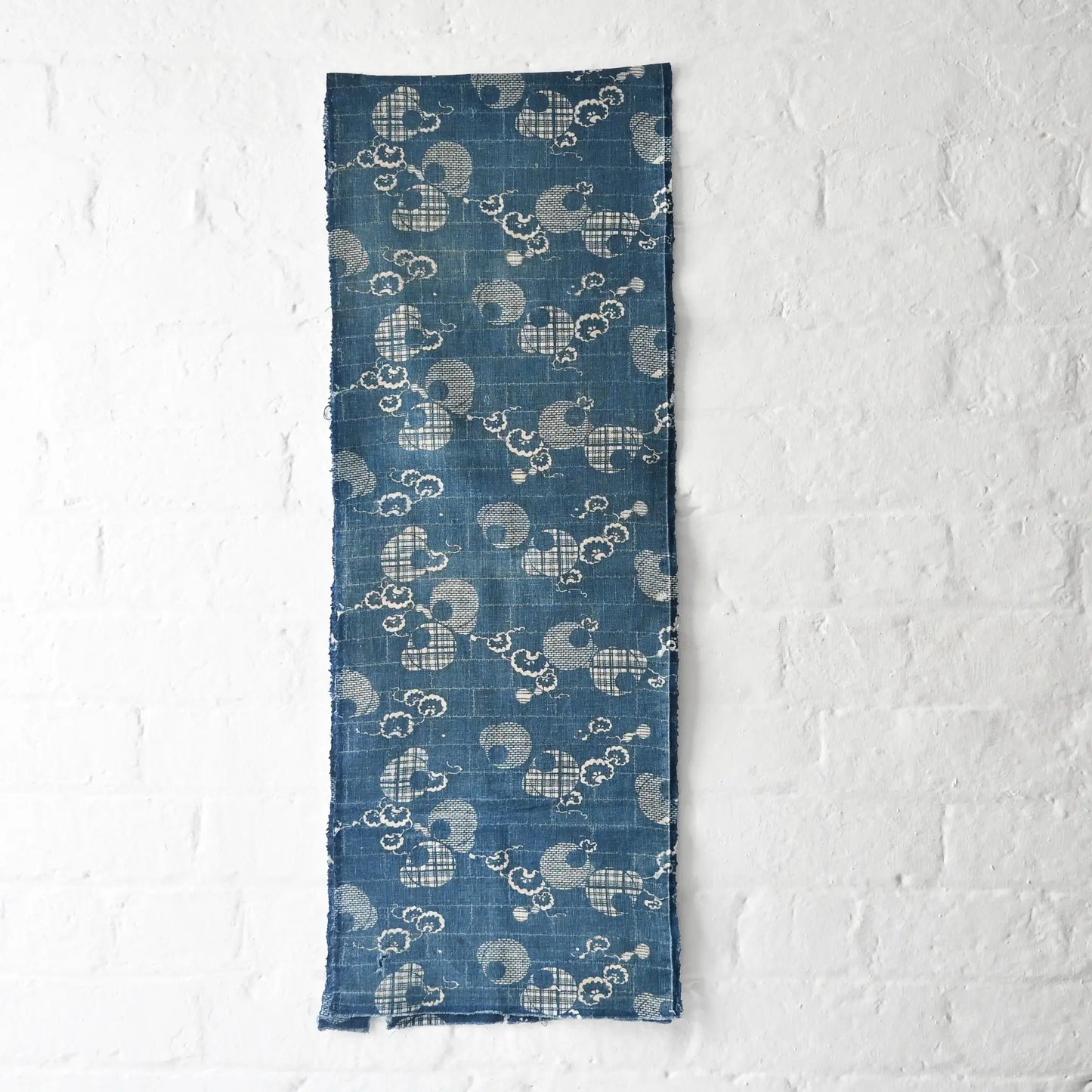 Full view of rare antique indigo Katazome stencil died cotton with a delicate snowflake motif.