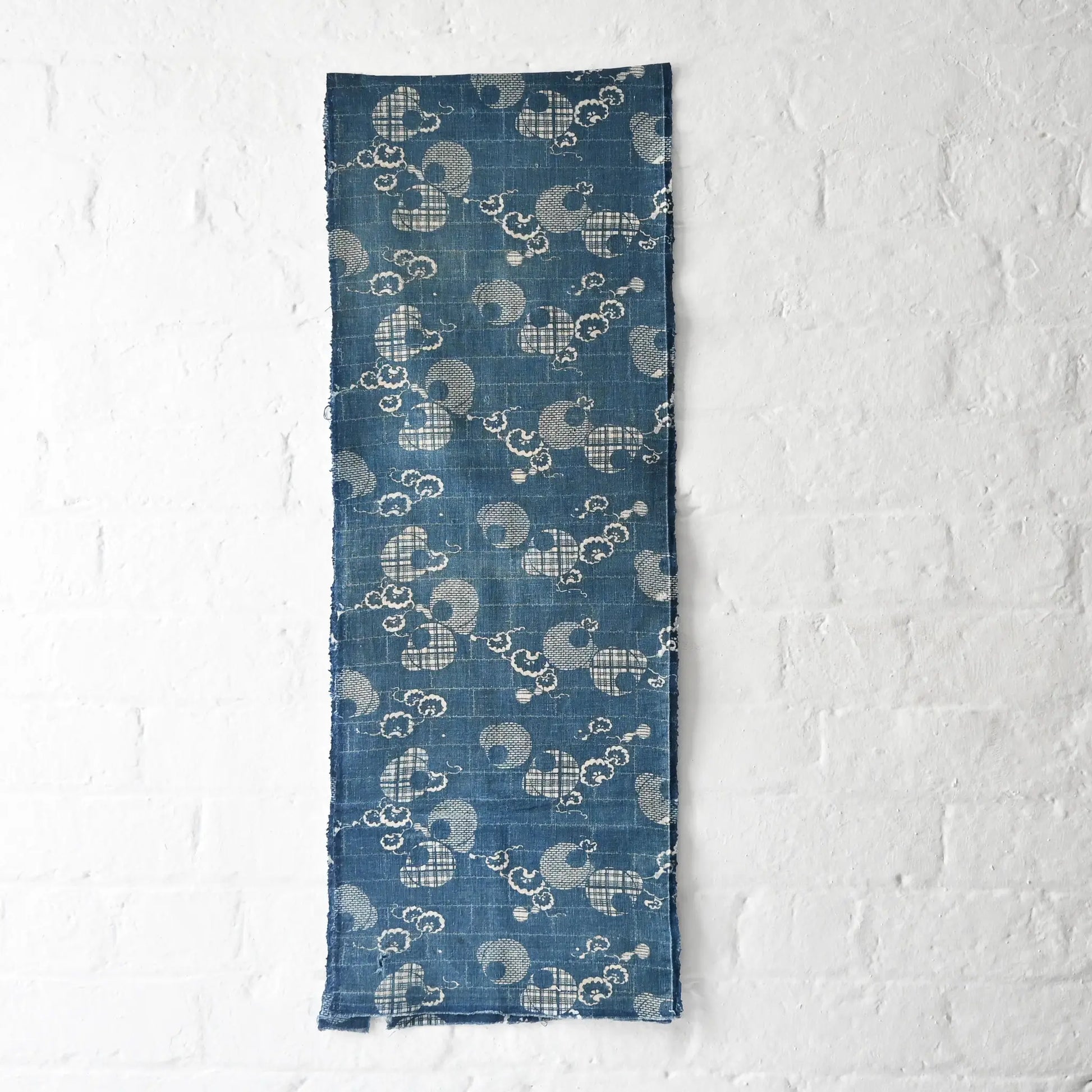 Full view of rare antique indigo Katazome stencil died cotton with a delicate snowflake motif.
