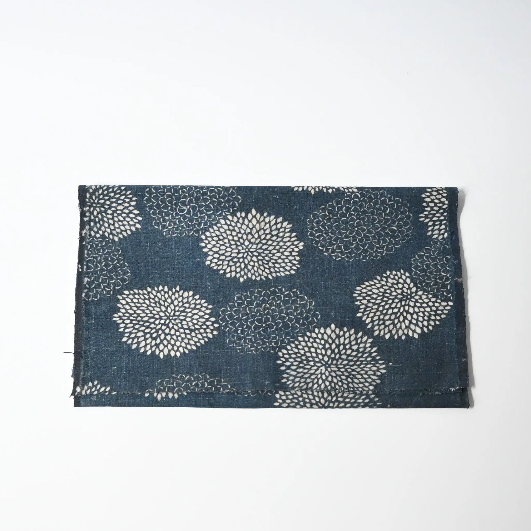Antique indigo katazome dyed cotton with chrysanthemum motif.