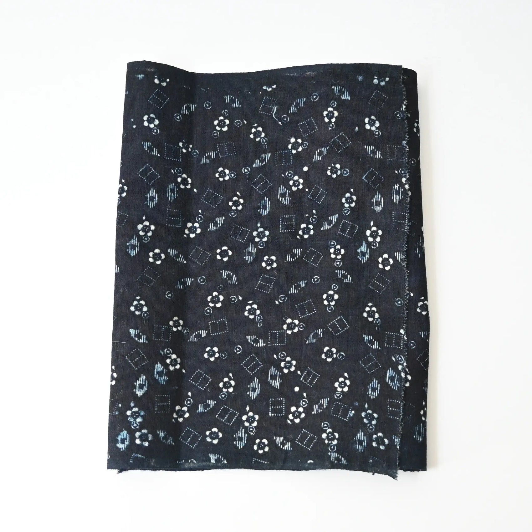 Antique indigo katazome dyed cotton with fine dots and lines, and plum blossoms, early 20th century.